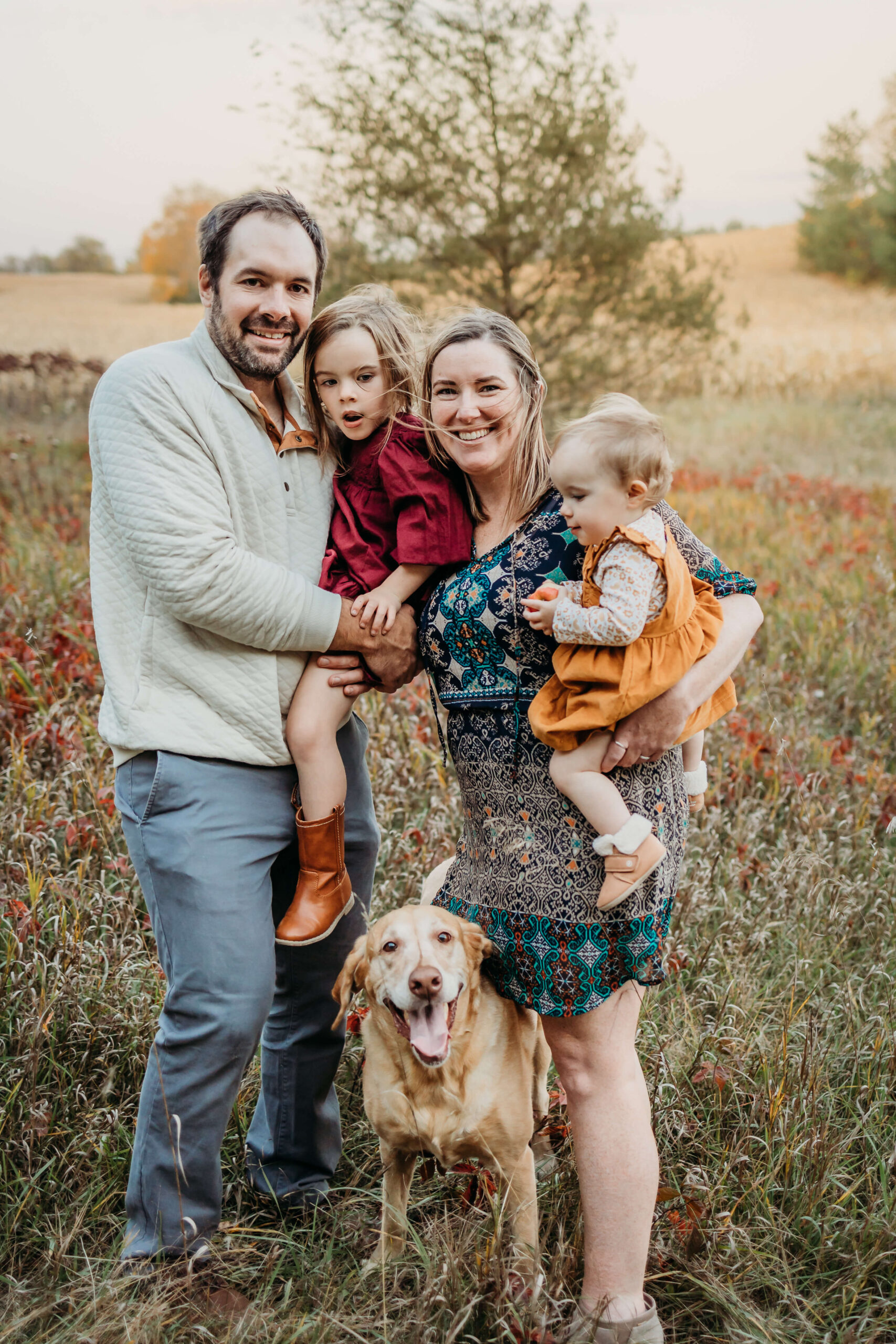 family of four with their dog in a field Parenthood is so precious, but it can be challenging to remember to enjoy it. By scheduling some new things to do in Eau Claire, WI, you’ll create wonderful memories your entire family will cherish. 